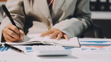 Business meetings to analyze investment strategies and brainstorm sales plans for a more profitable business. video