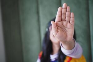 The Hand Gesture in Focus A Clear Symbol Representing Stop or Refusal in Communication photo