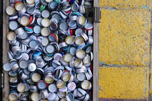 turkey istanbul 18 january 2024. Assorted bottle caps create a colorful background, ideal for beverage, beer, and soda designs photo