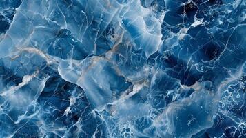 A blue marble pattern with white veins and light blue accents. photo
