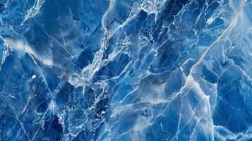 A blue marble pattern with white veins and light blue accents. photo