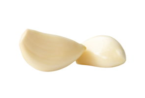 Side view of white garlic clove in stack isolated with clipping path in file format png
