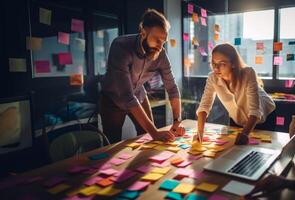 A group of professional colleagues collaboratively tackles business challenges, engaging in a dynamic teamwork session to strategize and find effective solutions photo