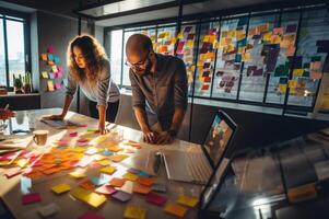 A group of professional colleagues collaboratively tackles business challenges, engaging in a dynamic teamwork session to strategize and find effective solutions photo