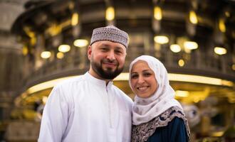 Portrait of a Muslim couple in white Ihram garments at a sacred site, reflecting their devotion and unity during pilgrimage.Generated image photo
