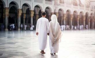 Portrait of a Muslim couple in white Ihram garments at a sacred site, reflecting their devotion and unity during pilgrimage.Generated image photo