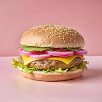 Delicious Cheeseburger with Fresh Vegetables on Pink Background photo