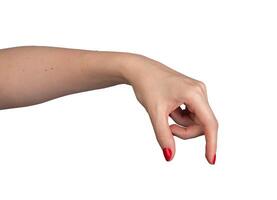 A hand using two fingers thumb and index finger to measure or show the size of an invisible object. photo