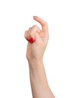 A hand with an index finger bent and pointing, isolated against a white background. The gesture is photo