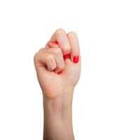 Hand showing the sign for 14. Isolated on white background, closeup of a womans hand with elegant photo