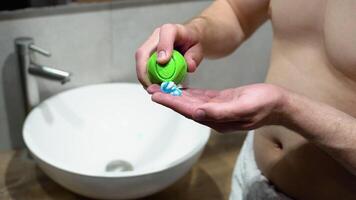 Man Applying Shave Foam On Arm While Standind Near Mirror In Bathroom, Close Up video