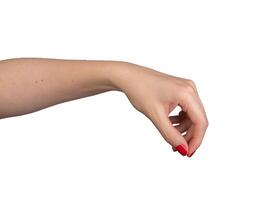 A hand making a pinch gesture with the thumb and forefinger, used to indicate a small size or to photo