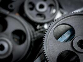 Engine gears wheels and auto parts engine machinery components at heavy industry manufacturing factory. photo
