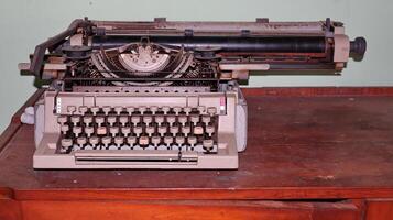 Closeup shot of types and mechanism of retro typewriter photo