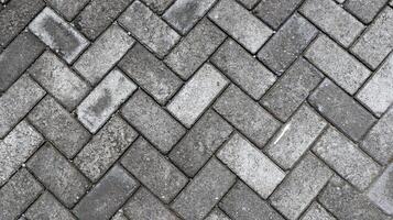 Outdoor gray paving blocks stone texture photo