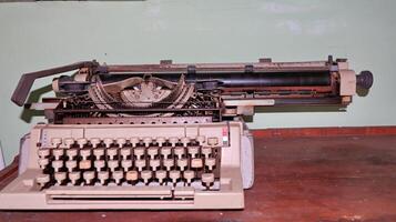 Closeup shot of types and mechanism of retro typewriter photo