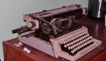 Closeup shot of types and mechanism of retro typewriter photo