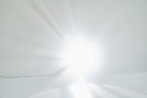 The light effect is a flash. A light beam in the room, a bright flash. With space to copy, overlay for your design photo