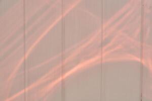 Blurry overlay effect for photos and layouts. The texture of a wall with incident rays of light on a white wall. shadows for creating natural lighting effects