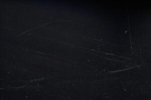 Close up view of an abstract background with white scratches isolated on black background with empty, copy space. Template, mock up, overlay for your design, art photo