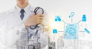 Front view of smart young male doctor crossed arm and holding stethoscope while standing outdoors with abstract city on background. Brain of a person and connection with medical equipment icons photo