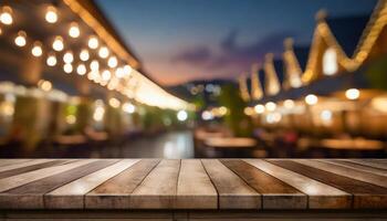 Empty wooden table in front of blurred bokeh background of restaurant. Mock up for display or montage products photo