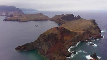 Sao Lourence Eastern Part of Madeira Island on Cloudy Day. Ponta do Furado Viewpoint. Cliffs, Mountains and Ocean. Portugal. Aerial Drone Shot. Moving Forward video