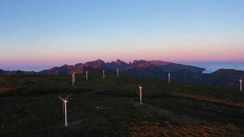 Wind Turbines on Mountain Plateau in Madeira at Sunset. Cloud Inversion. Portugal. Aerial Drone Shot. Moving Forward and Upwards video