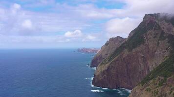 Mountains, Cliffs and Ocean. Vereda do Larano. Madeira, Portugal. Aerial View. Moving Forward video