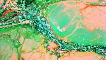 Abstract background with psychedelic painting in colorful vivid colors. Organic effect with fluid painting moving and sliding slowly. Swirls and spreading. video