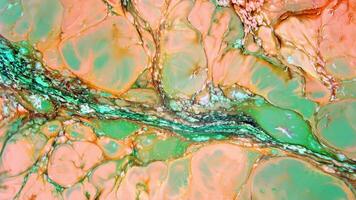 Abstract background with psychedelic painting in colorful vivid colors. Organic effect with fluid painting moving and sliding slowly. Swirls and spreading. video