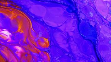 Abstract background with psychedelic painting in colorful vivid colors. Organic effect with fluid painting moving and sliding slowly. Swirls and spreading. video