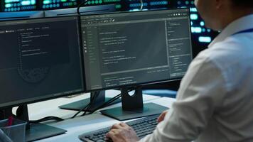 Data center technician responsible for installation and repair of networking equipment solving tasks. IT specialist doing maintenance on server room infrastructure, camera A video