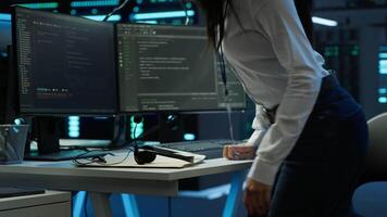 IT specialist in data center providing technical support to customers, troubleshooting issues. Server farm worker carrying out operational technical interventions requested by clients, camera A video