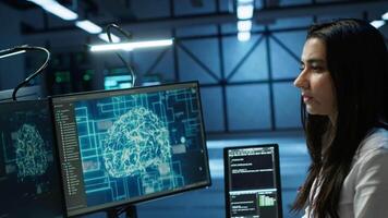 Admin does maintenance on server hub to optimize it for data processing requirements of artificial intelligence workloads. Expert inspects data center used for machine learning, camera A video