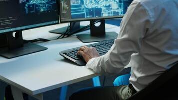 Computer scientist using AI tech on PC to do checkup in server room. IT staff member in data center using artificial intelligence technology to process datasets for training, camera A video