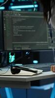 Vertical IT specialist in data center providing technical support to customers, troubleshooting issues. Server farm worker carrying out operational technical interventions requested by clients, camera A video