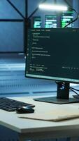 Vertical Computers in data center used for monitoring security attacks threatening supercomputers rows. PCs used by futuristic server hub workplace admins to protect equipment, handheld camera shot video