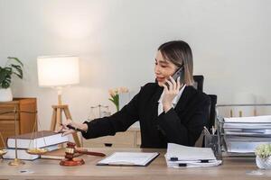 Young Lawyer Introducing and Signing Contract Documents with Clients in a Modern Office Setting photo