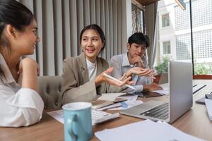 Business Professional Engaged in Discussion and Idea Exchange in Modern Office Setting photo