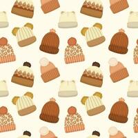 Seamless pattern with warm white hats for autumn and winter in brown colors on a light background vector