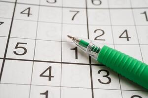 Sudoku puzzle, game to play for keep you brain younger for developing Alzheimer disease in senior patient. photo