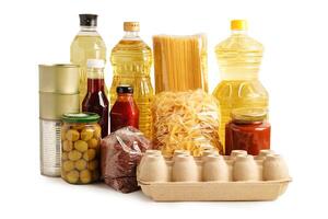 Foodstuffs for donation isolated on white background with clipping path for volunteer to help people. photo