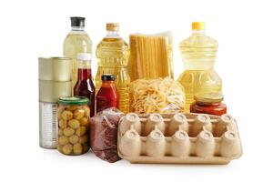 Foodstuffs for donation isolated on white background with clipping path for volunteer to help people. photo