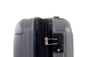 A gray locked suitcase or code lock on suitcase on a white background photo