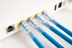 Ethernet cable with wireless router connect to internet service provider internet network. photo