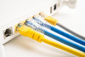 Ethernet cable for connect to wireless router link to internet service provider internet network. photo