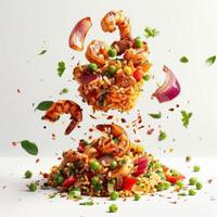 a pile of rice with shrimp and vegetables flying out of it photo