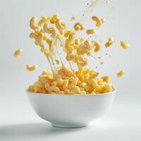 araffe macaroni and cheese being tossed in a bowl photo