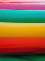 Abstract background of bright colourful plastic playground photo